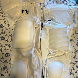 1 Nike Dri-Fit, 1 Under Armour YL Football Pants